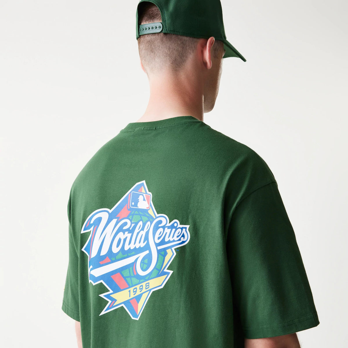 The model is wearing this MLB World Series New York Yankees T-Shirt in dark green. 6