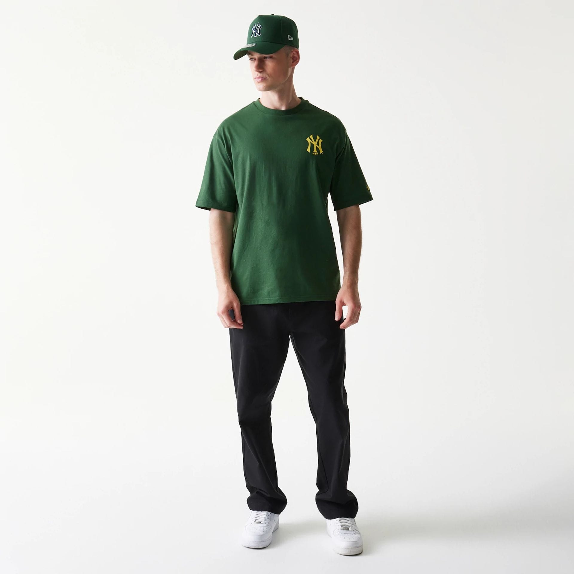 The model is wearing this MLB World Series New York Yankees T-Shirt in dark green. 8