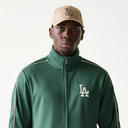 The model is wearing this MLB Piping LA Dodgers Track Jacket in dark green. 6