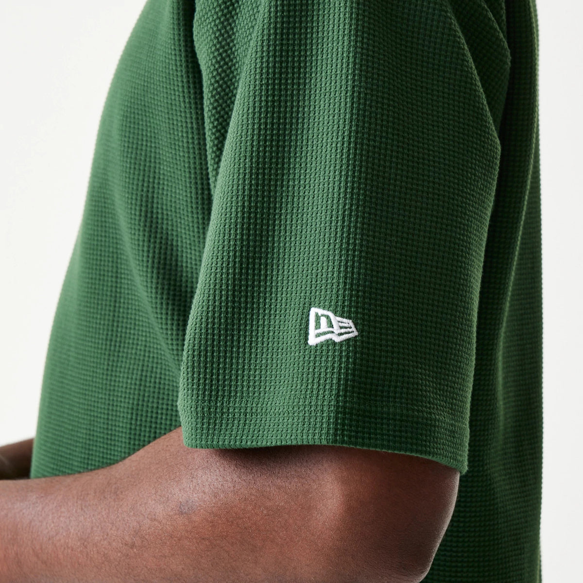 The model is wearing this MLB Waffle LA Dodgers Oversized T-Shirt in dark green. 6