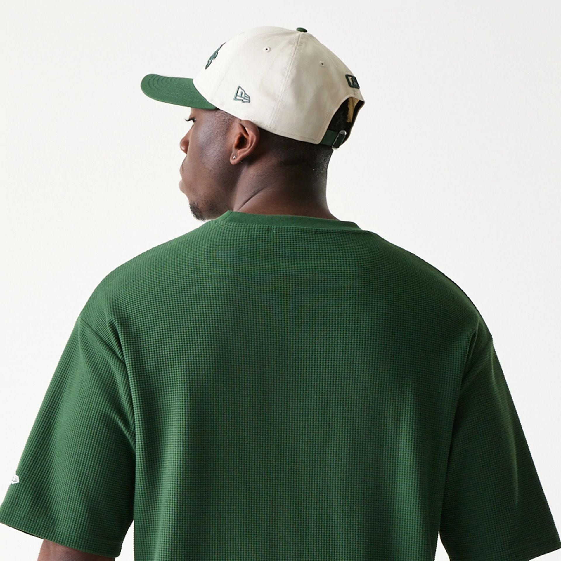 The model is wearing this MLB Waffle LA Dodgers Oversized T-Shirt in dark green. 3