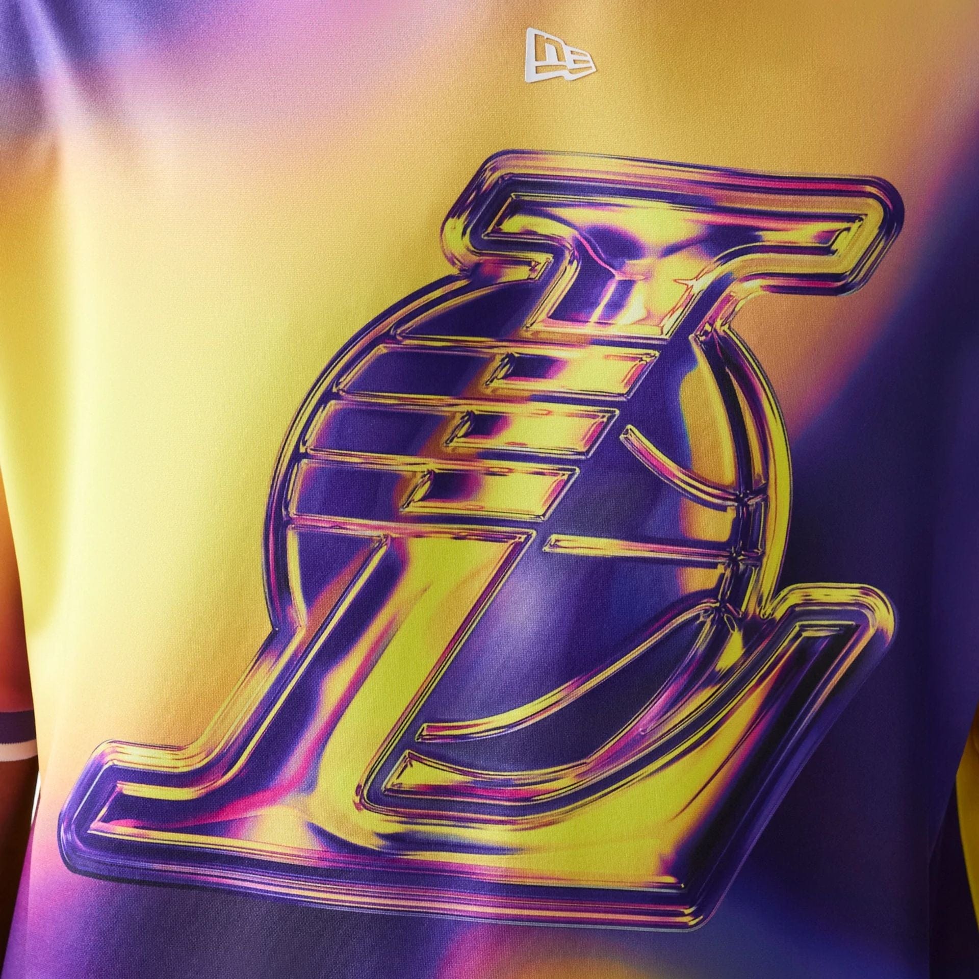 The model is wearing this NBA All Over Print LA Lakers T-Shirt in purple. 5