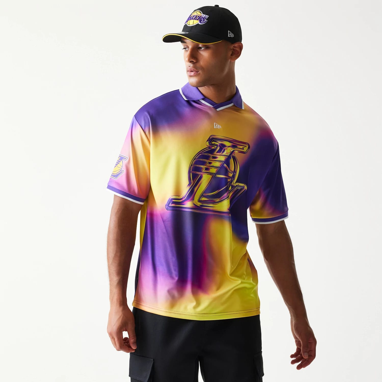 The model is wearing this NBA All Over Print LA Lakers T-Shirt in purple. 1