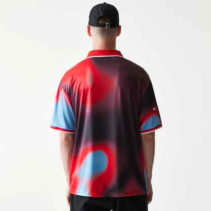 The model is wearing this NBA All Over Print Chicago Bulls T-Shirt in red. 2