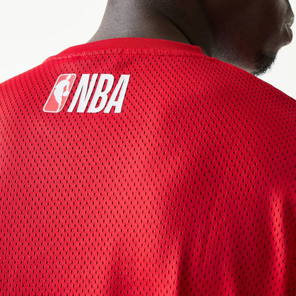 The model is wearing this NBA Graphic Mesh Chicago Bulls T-Shirt in red.  6
