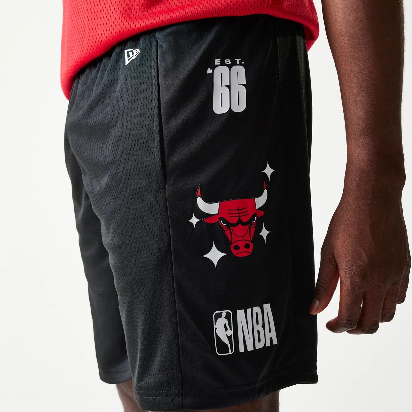 The model is wearing this NBA Mesh Chicago Bulls Shorts in black. 6