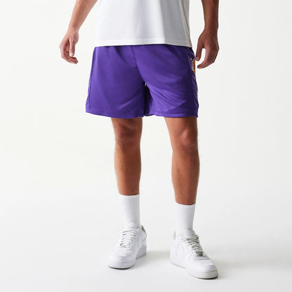 The model is wearing this NBA Mesh LA Lakers Shorts in purple. 3