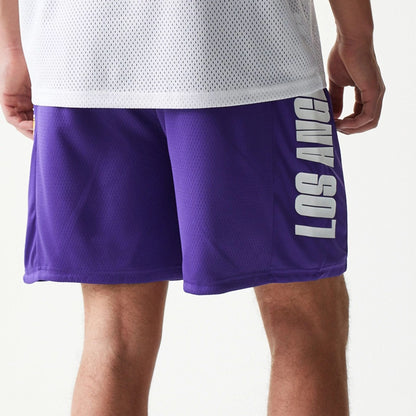 The model is wearing this NBA Mesh LA Lakers Shorts in purple. 7