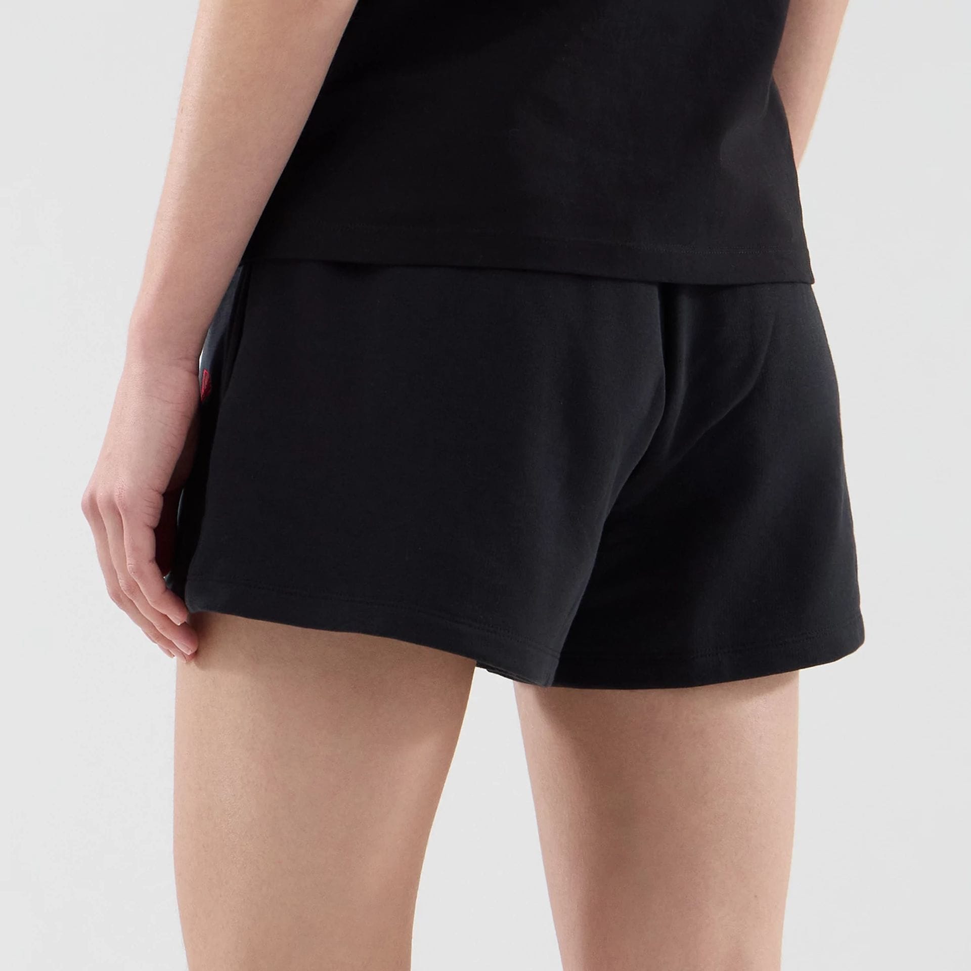 The model is wearing this Womens MLB Infill New York Yankees Shorts in black. 7