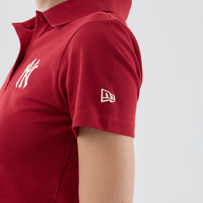 New Era New York Yankees Womens MLB Dark Red Cropped Slim Polo T-shirt, side view showing the NY logo embroidered on the chest and a white embroidered New Era logo on the short sleeve, with a classic ribbed collar at the top.