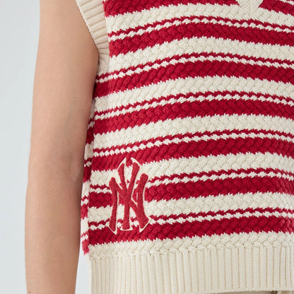 The model is wearing this Womens MLB Knit Stripe New York Yankees Sleeveless  V-neck Sweater in dark red. 3