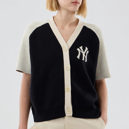New Era New York Yankees Womens MLB Knit Stripe Black Short Sleeve Cardigan, front view on a model showing the white embroidered NY logo on the left chest, contrasting beige buttons along the front placket, and short sleeves with black.