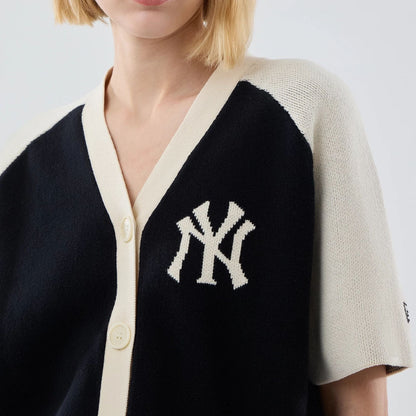 The model is wearing this Womens MLB Knit Stripe New York Yankees Short Sleeve Cardigan in black. 4