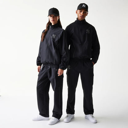 The model is wearing this MLB New York Yankees Jacket in black. 1