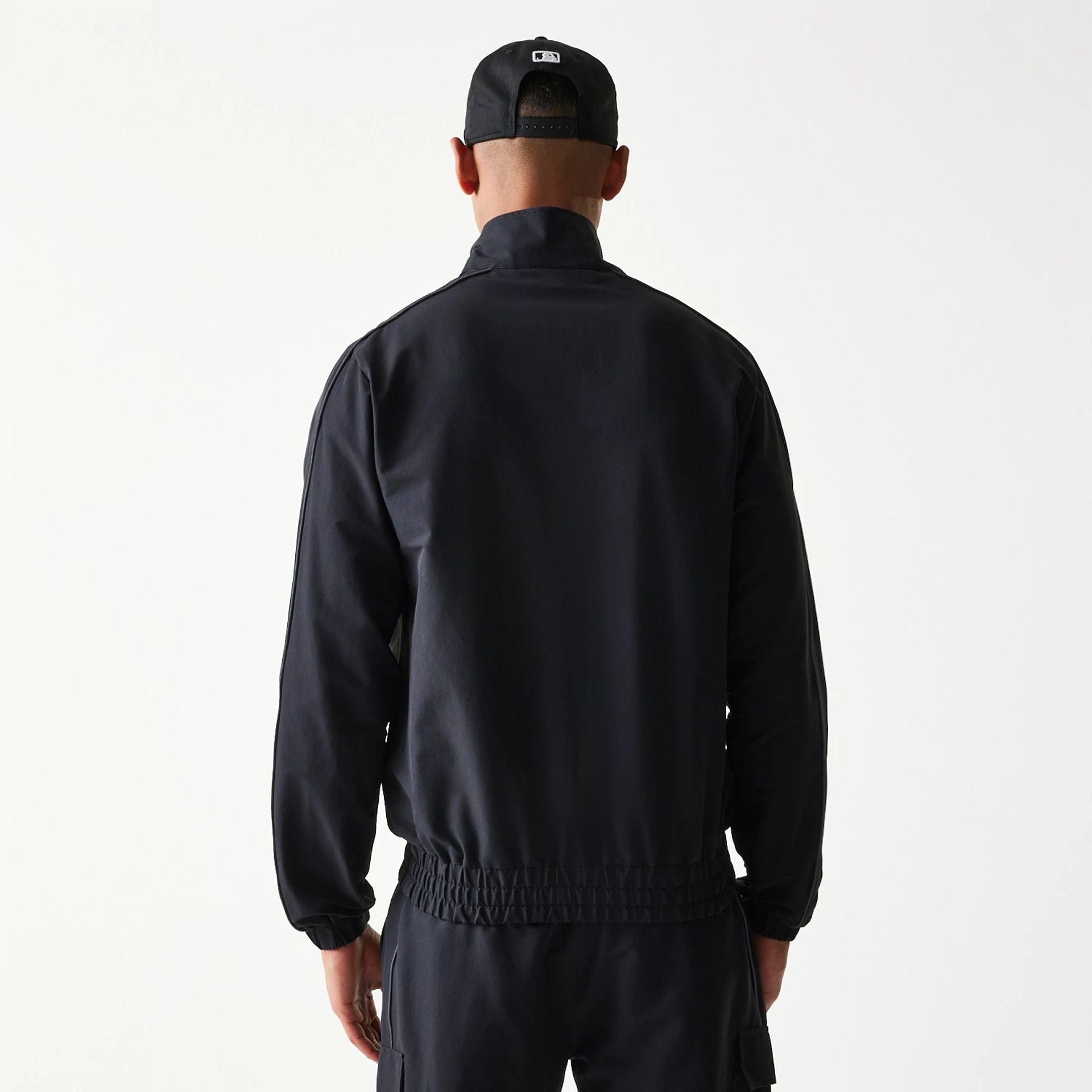 The model is wearing this MLB New York Yankees Jacket in black. 2