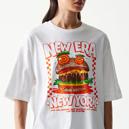The model is wearing this New Era Burger Food Graphic Oversized T-Shirt in white. 5