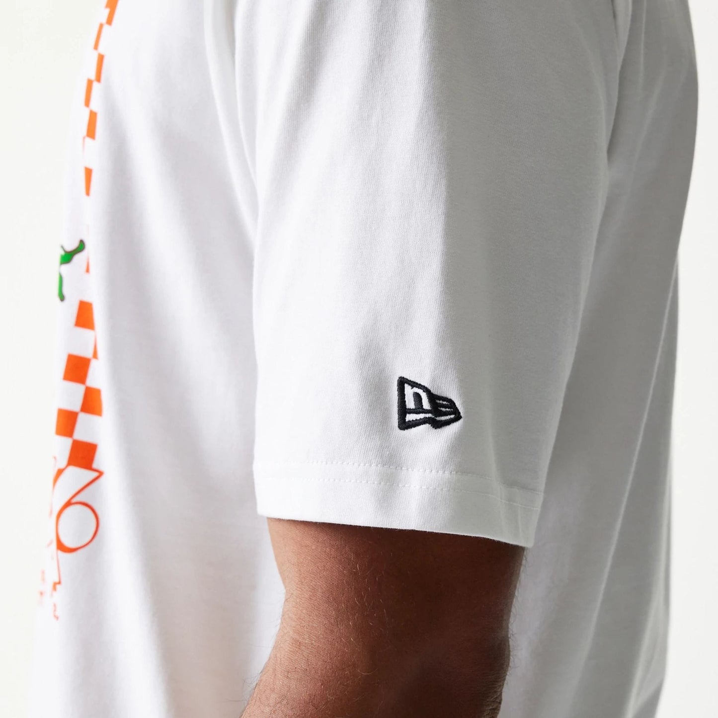 The model is wearing this New Era Burger Food Graphic Oversized T-Shirt in white. 7