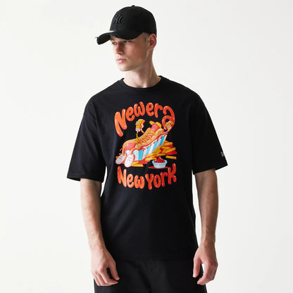The model is wearing this New Era Hotdog Food Graphic Oversized T-Shirt in black. 3