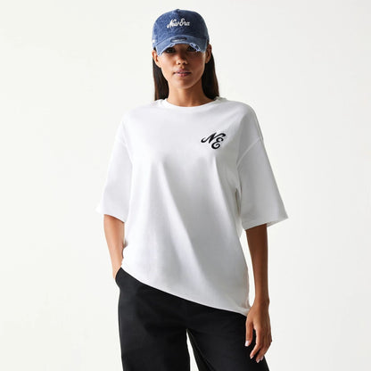 The model is wearing this New Era Floral Graphic Oversized T-Shirt in white. 4