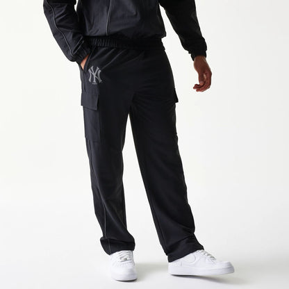 The model is wearing this MLB Utility New York Yankees Straight Leg Cargo Joggers in black. 1