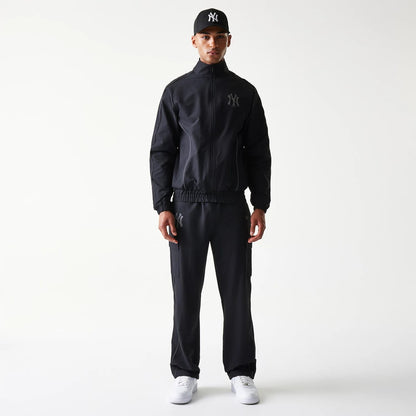 The model is wearing this MLB Utility New York Yankees Straight Leg Cargo Joggers in black. 8