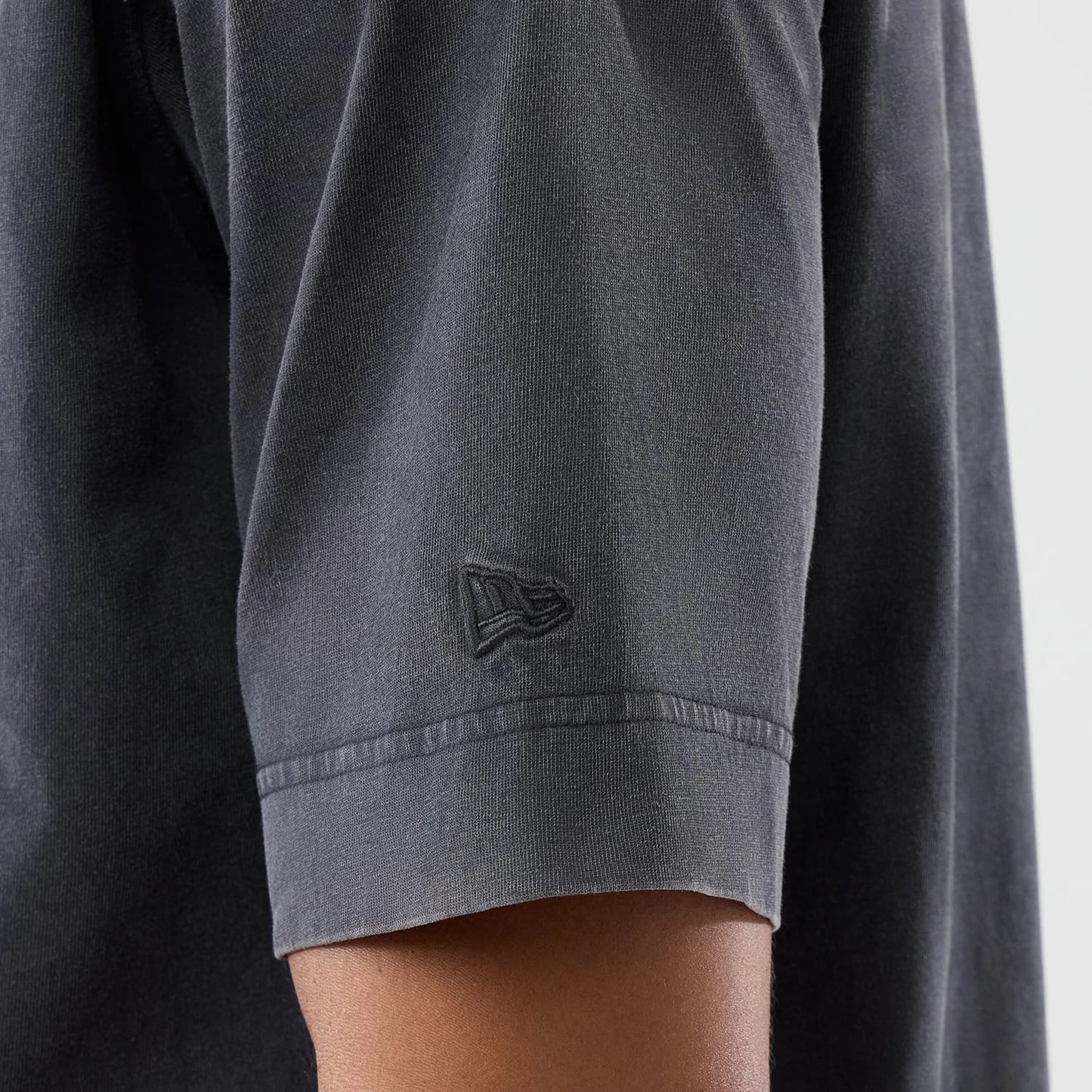 The model is wearing this MLB Washed New York Yankees T-Shirt in black. 5