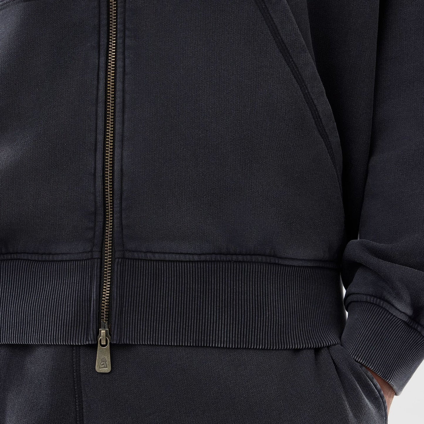 The model is wearing this MLB Washed New York Yankees Full Zip Hoodie in black. 5