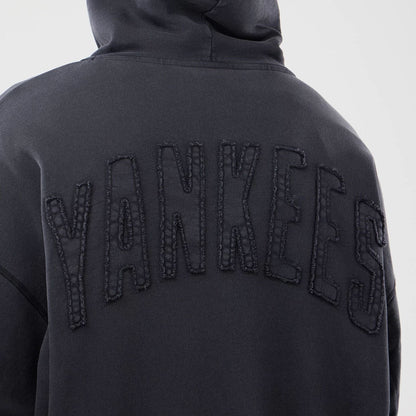 The model is wearing this MLB Washed New York Yankees Full Zip Hoodie in black. 7