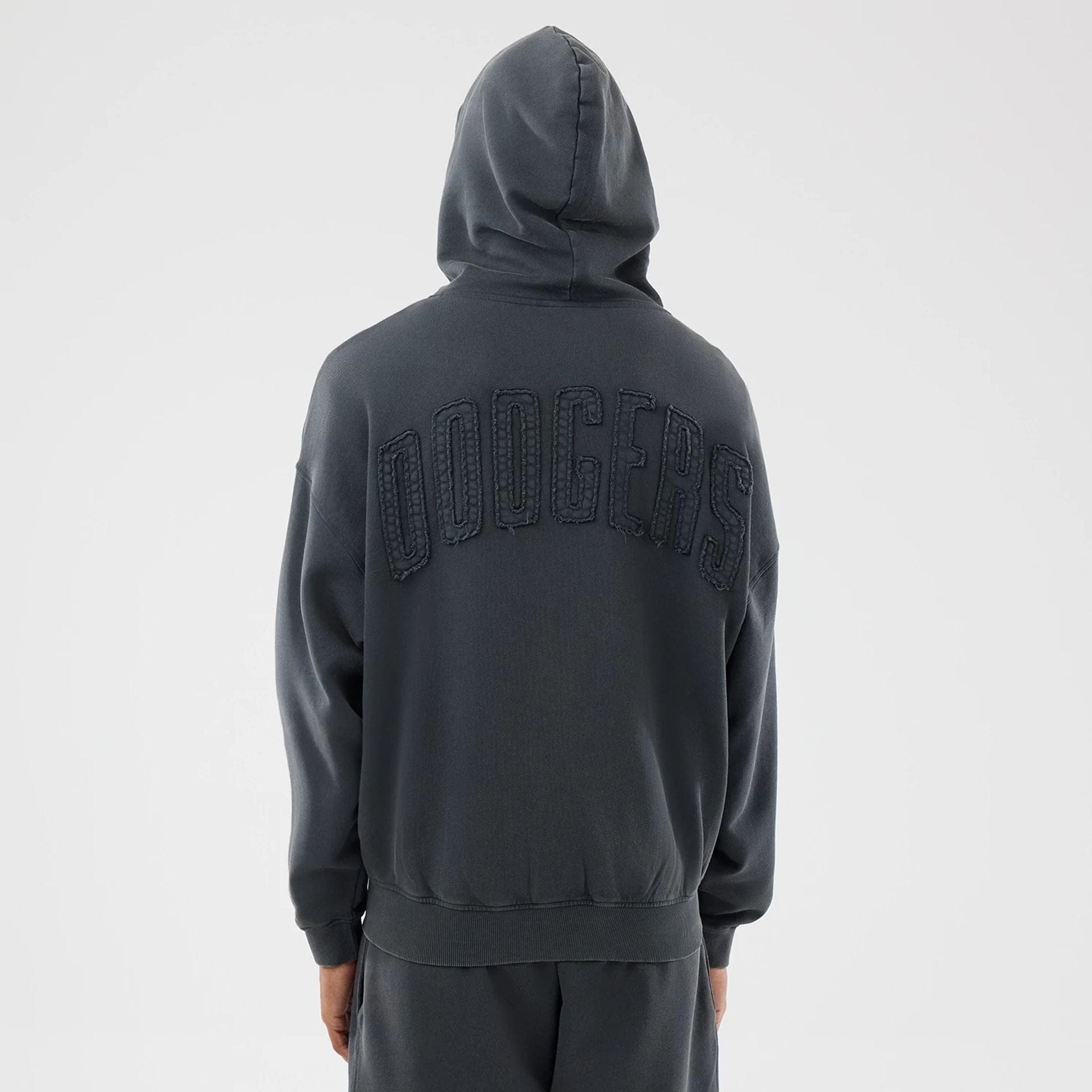 The model is wearing this MLB Washed LA Dodgers Full Zip Hoodie in Dark Grey. 2