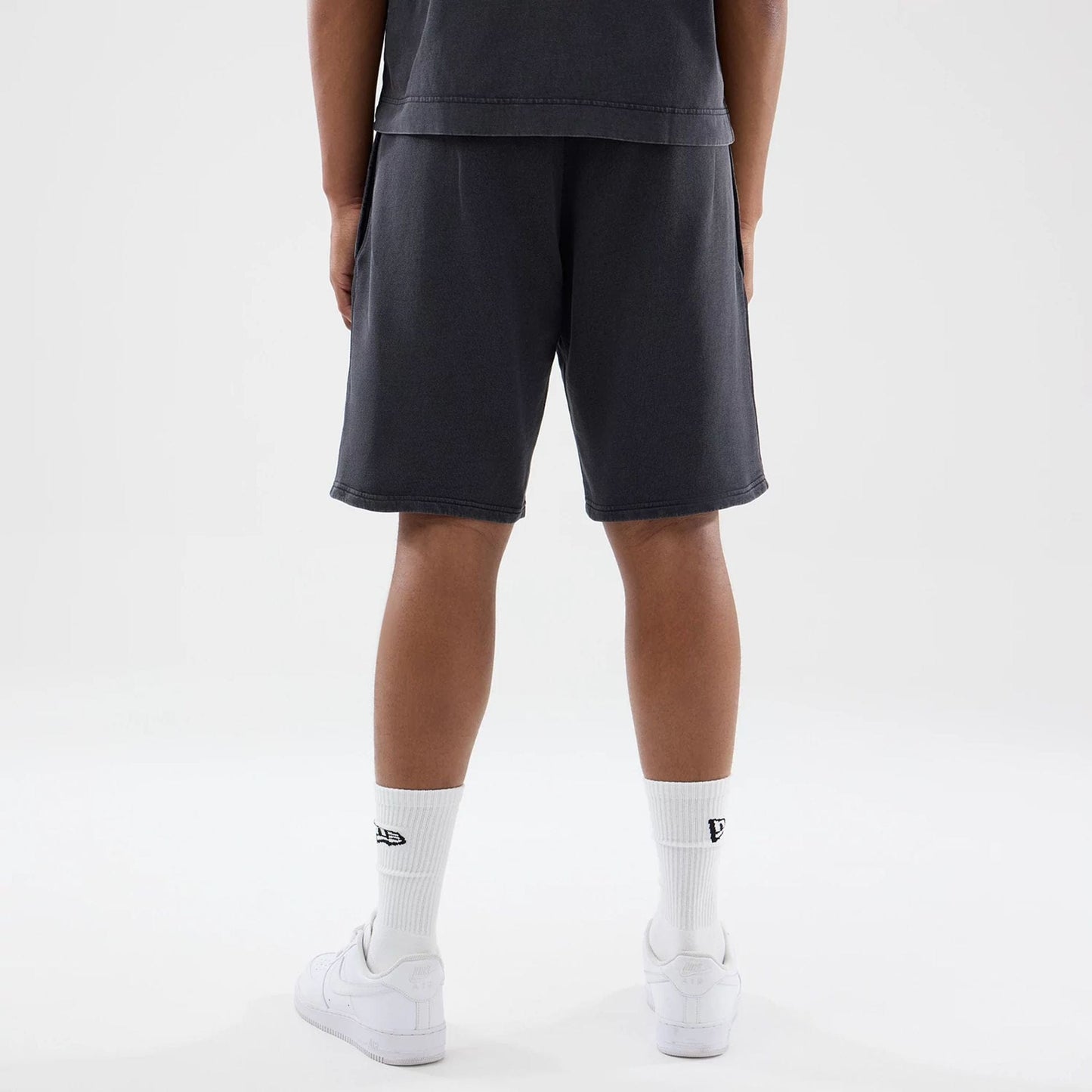 The model is wearing this MLB Washed New York Yankees Shorts in black. 2