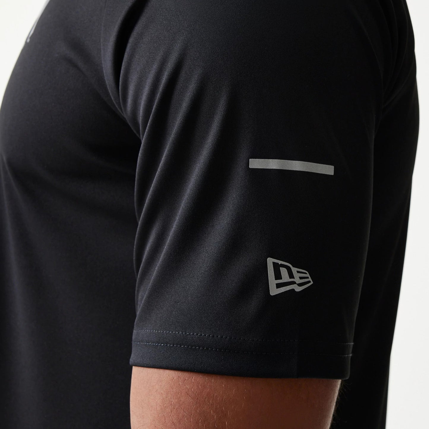The model is wearing this MLB New York Yankees Reflective T-Shirt in black. 5