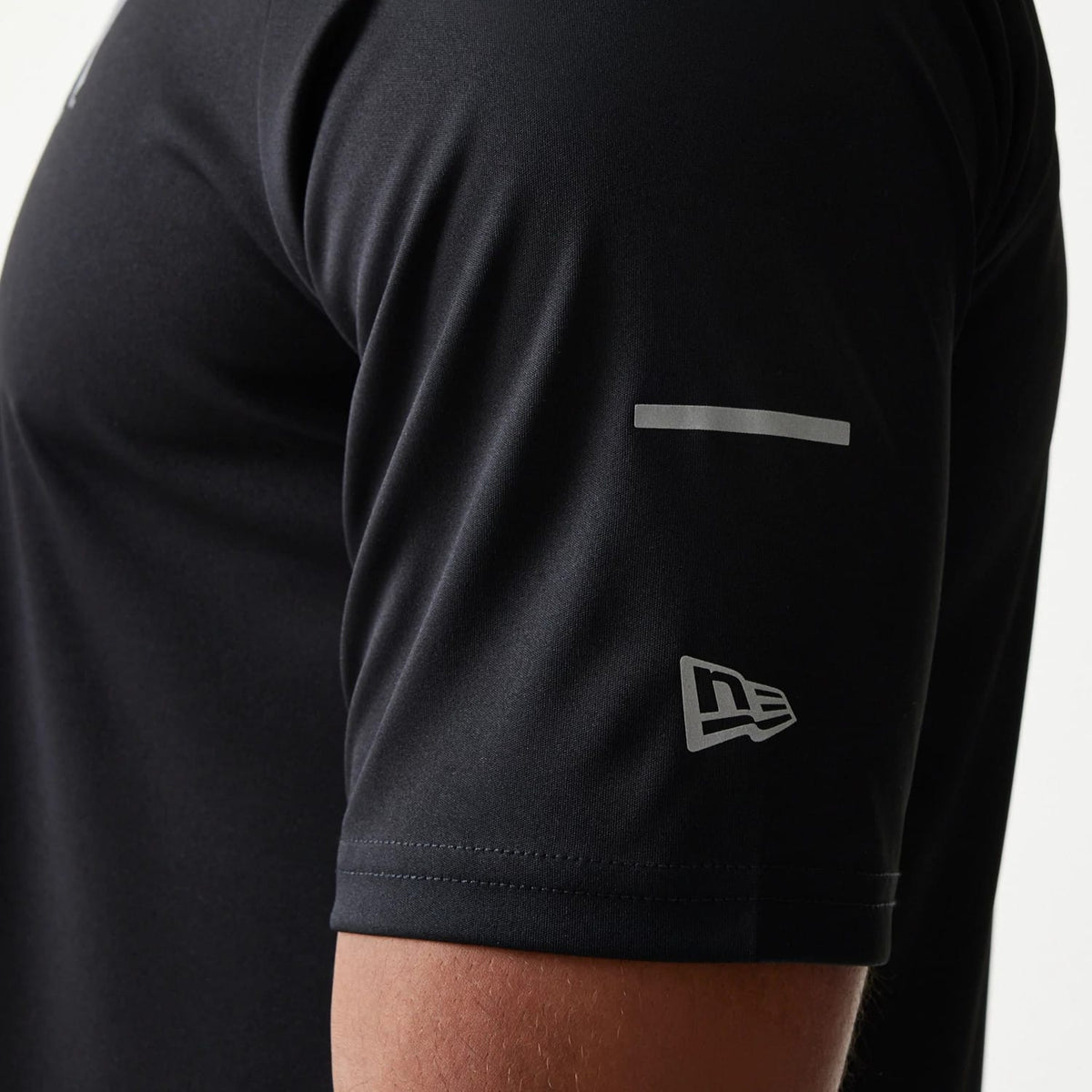 The model is wearing this MLB New York Yankees Reflective T-Shirt in black. 5
