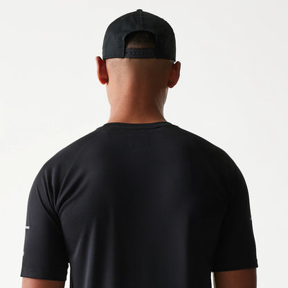 The model is wearing this MLB New York Yankees Reflective T-Shirt in black. 7