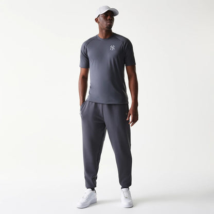 The model is wearing this MLB New York Yankees Joggers in dark grey. 8