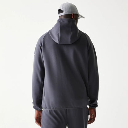 The model is wearing this MLB New York Yankees Full Zip Hoodie in dark grey. 2
