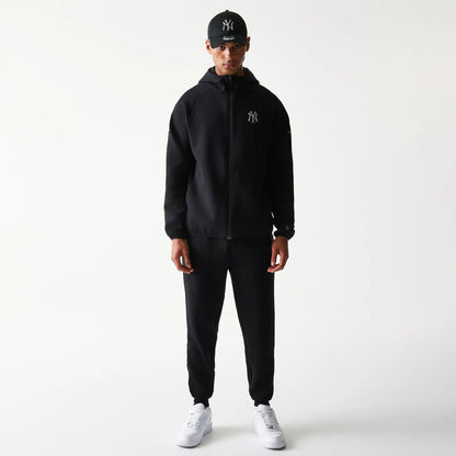 The model is wearing this MLB New York Yankees Full Zip Hoodie in black. 8