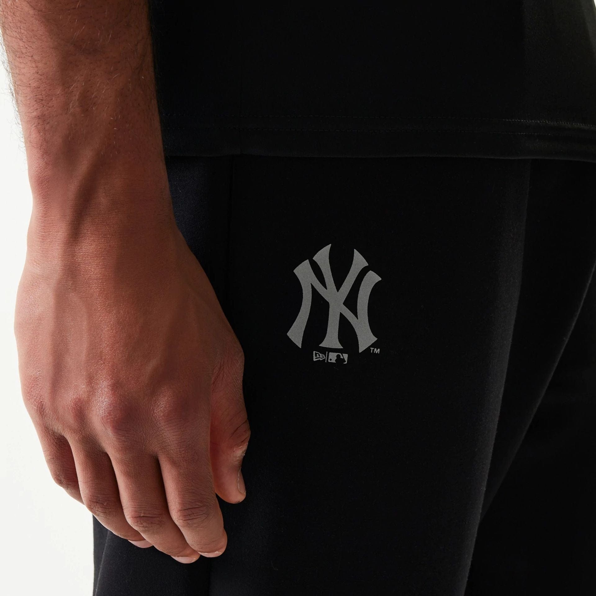 The model is wearing this MLB New York Yankees Joggers in black. 4