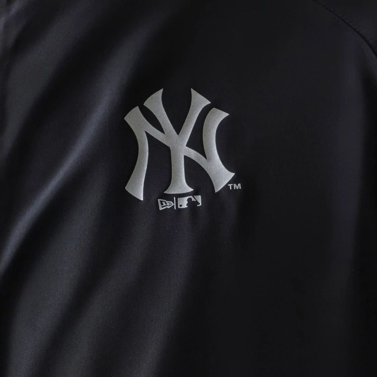 The model is wearing this MLB New York Yankees Jacket in black. 5