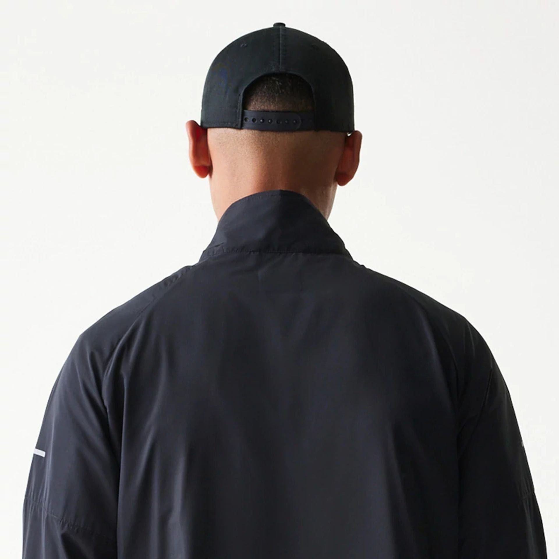 The model is wearing this MLB New York Yankees Jacket in black. 7