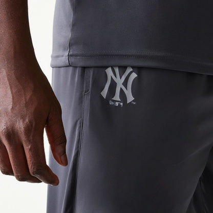 The model is wearing this MLB New York Yankees Track Pants in dark grey. 4