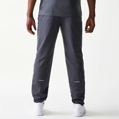 The model is wearing this MLB New York Yankees Track Pants in dark grey. 2