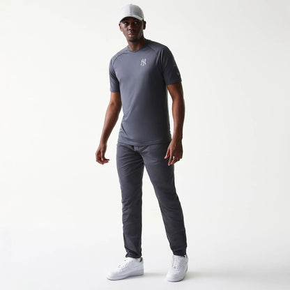 The model is wearing this MLB New York Yankees Track Pants in dark grey. 8