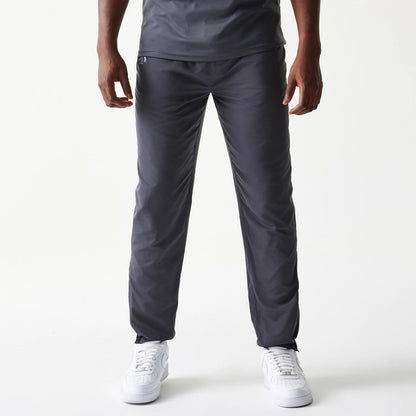 The model is wearing this MLB New York Yankees Track Pants in dark grey. 1