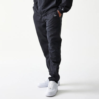 The model is wearing this MLB New York Yankees Track Pants in black. 7