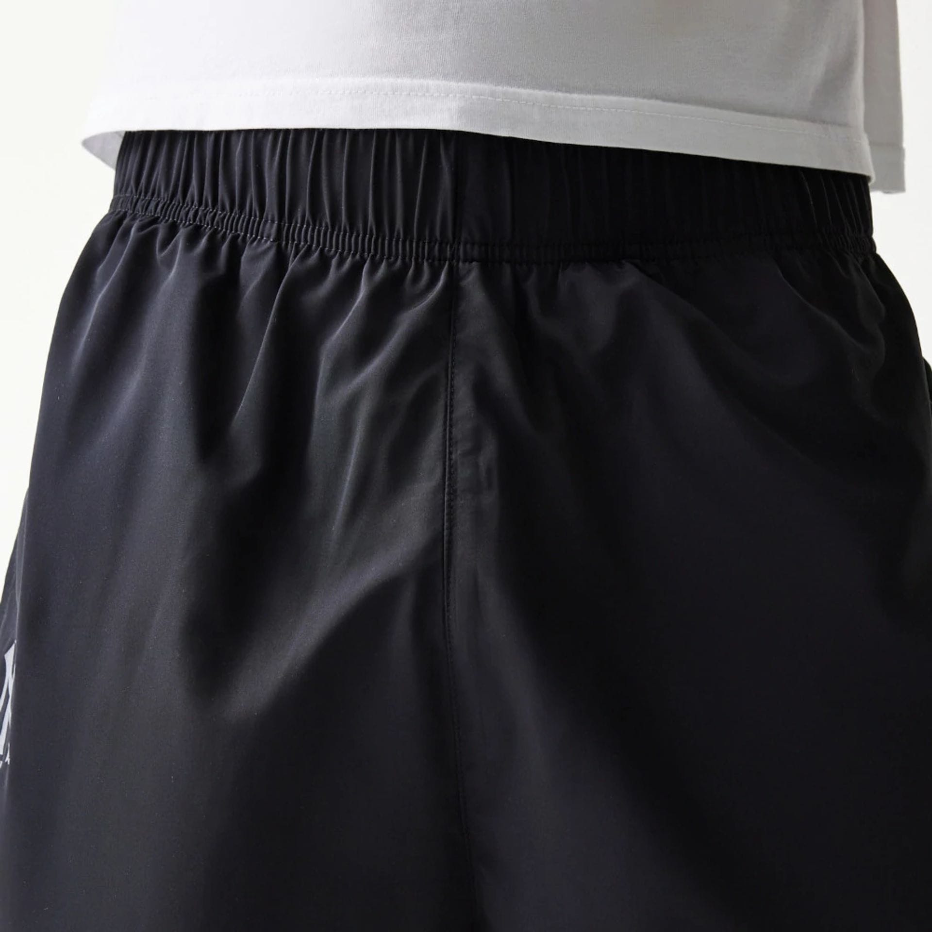 The model is wearing this MLB New York Yankees Track Pants in black. 6