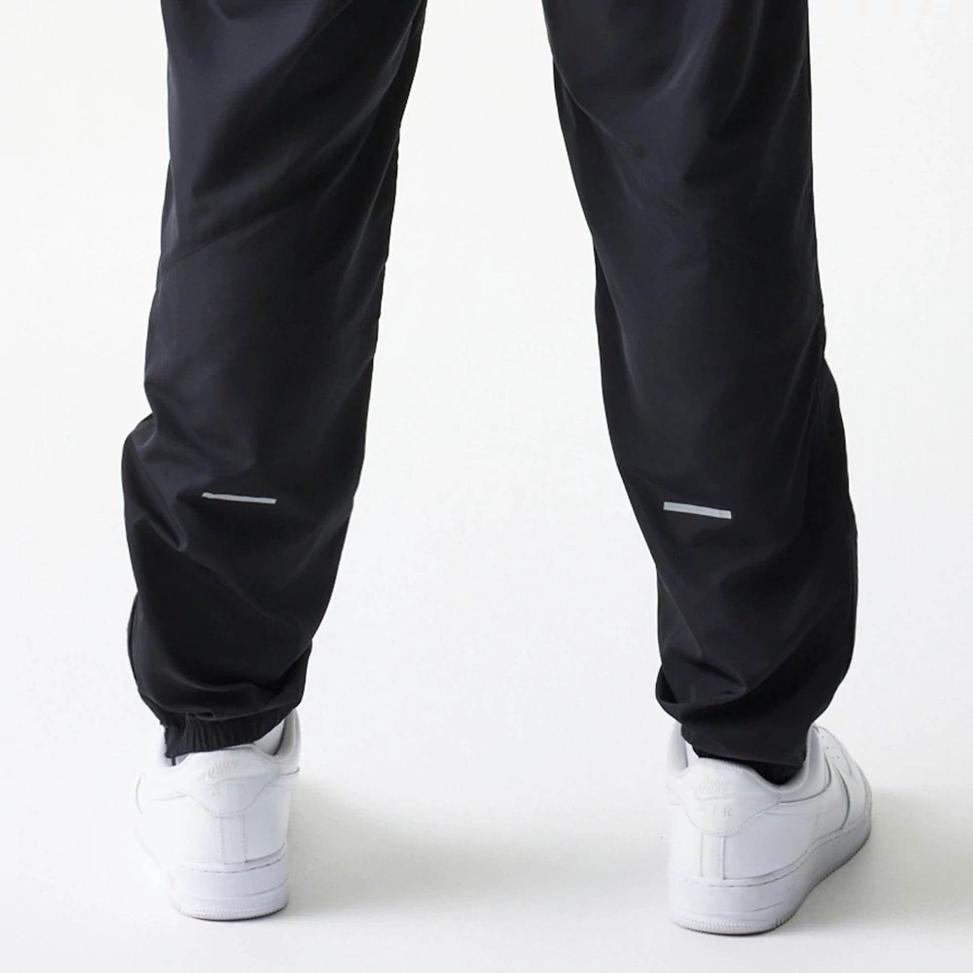 The model is wearing this MLB New York Yankees Track Pants in black. 5