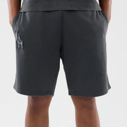 The model is wearing this MLB Washed LA Dodgers Shorts in Dark Grey. 5