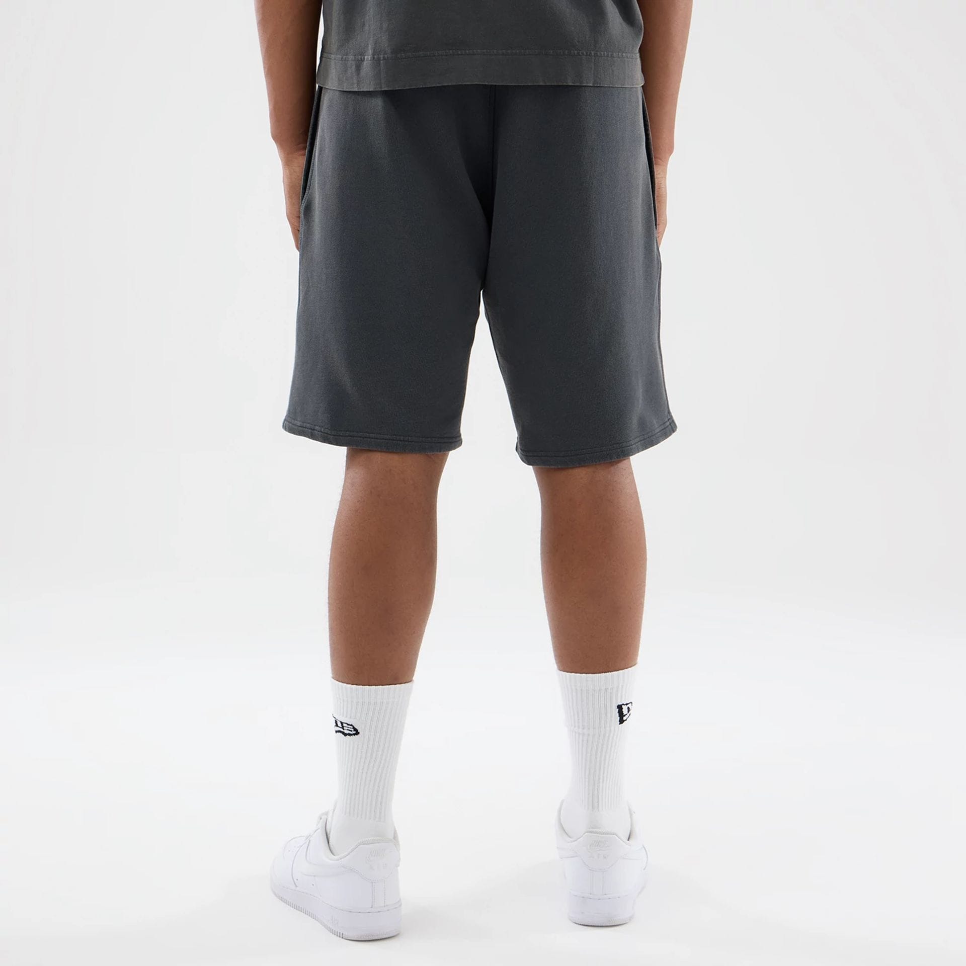 The model is wearing this MLB Washed LA Dodgers Shorts in Dark Grey. 2