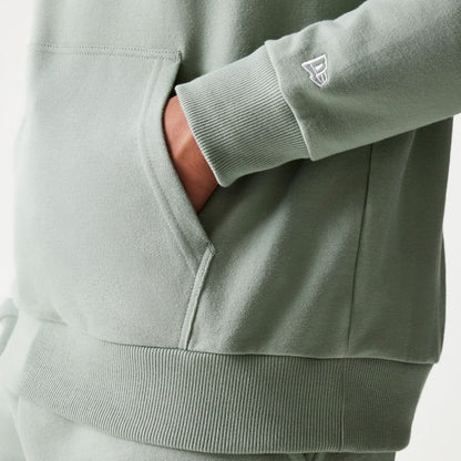 The model is wearing this MLB League Essential Midi LA Dodgers Oversized Pullover Hoodie in pastel green. 5