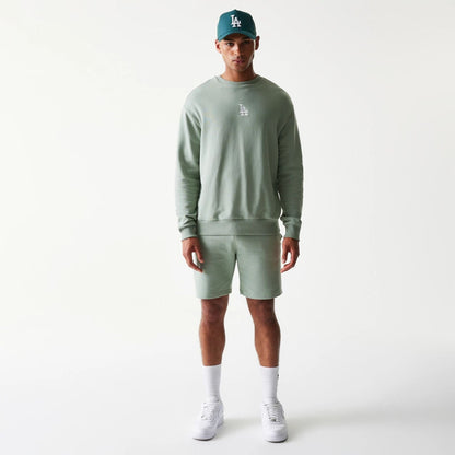 The model is wearing this MLB League Essential Midi LA Dodgers Oversized Crew Neck Sweater in pastel green. 8
